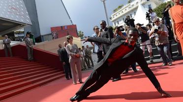 Le Burkinabé Souleymane Démé, danseur handicapé et acteur principal du film tchadien "Grigris", le 22 mai 2013 à Cannes [Anne-Christine Poujoulat / AFP]