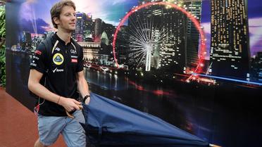 Le pilote français de l'écurie Lotus, Romain Grosjean, le 21 septembre 2012 dans le paddock du GP de Singapour. [Punit Paranjpe / AFP]