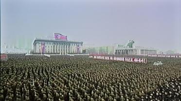 Capture d'image de la télévision nord-coréenne montrant des centaines de milliers de Nord-Coréens rassemblés pour célébrer le lancement réussi de la fusée, le 14 décembre 2012 à Pyongyang [ / Télévision nord-coréenne/AFP]