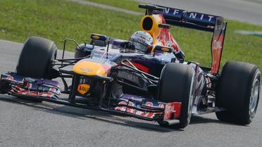 Sebastian Vettel au volant de sa Red Bull-Renault lors des qualifications du Grand Prix de Malaisie à Sepang, le 23 mars 2013 [Philippe Lopez / AFP]