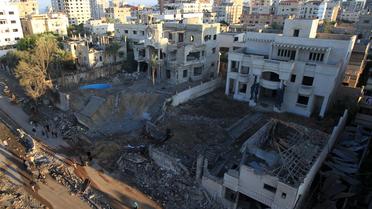 Des maisons détruites par une frappe aérienne israélienne, l e 15 novembre 2012 à Gaza [Mahmud Hams / AFP]