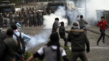 Heuirts entre manifestants égyptiens et policiers, le 29 janvier 2013 place Tahrir, au Caire [Mohammed Abed / AFP]