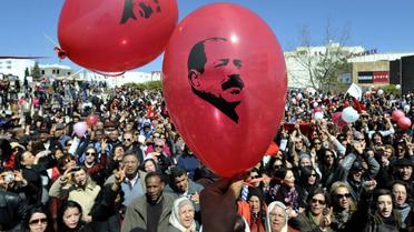 Lâcher de centaines de ballons à l'effigie de l'opposant tunisien assassiné Chokri Belaïd, le 17 mars 2013 à Tunis [Fethi Belaid / AFP]