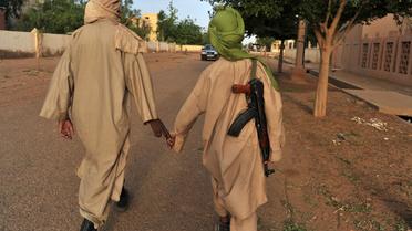 Des combattants du groupe islamiste Mujao, le 17 juillet 2012 à Gao [Issouf Sanogo / AFP]