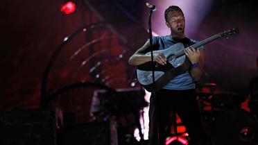 Pour leur première venue au Stade de France dimanche, les Britanniques de Coldplay ont invité Rihanna à les rejoindre sur scène lors d'un concert féérique aux couleurs de leur dernier album "Mylo Xyloto".[AFP]