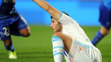 L'attaquant de Marseille André-Pierre Gignac, blessé à un pied, appelle les soigneurs, lors d'un match de L1 à Troyes, le 21 octobre 2012. [Denis Charlet / AFP]