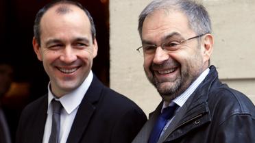 L'actuel secrétaire général de la CFDT François Chérèque (d) et son successeur Laurent Berger, le 22 novembre 2012 à Paris [Francois Guillot / AFP]