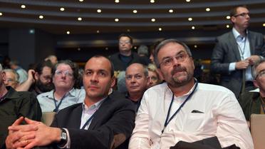 De gauche à droite, Laurent Berger et François Chérèque à l'assemblée générale de la CFDT, qui se déroule à Paris le 28 novembre 2012 [Miguel Medina / AFP]