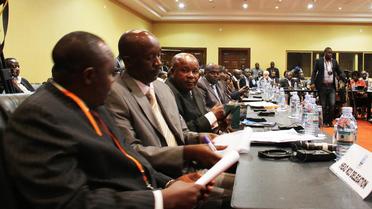 Des membres due la délégation du M23, le 11 décembre 2012 à Kampala [Isaac Kasamani / AFP]