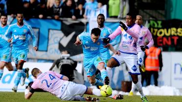 Le Marseillais Mathieu Valbuena (c), lors du match de Ligue 1 contre Evian/Thonon, le 10 février 2013 au Parc des sports in Annecy. [Jean-Pierre Clatot / AFP/Archives]