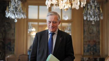 Le gouverneur de la Banque de France, Christian Noyer pose au siège de l'établissement, à Paris le 28 mars 2013 [Eric Piermont / AFP]