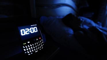 Un smartphone indique 2H00 du matin [Jean-Sebastien Evrard / AFP/Archives]