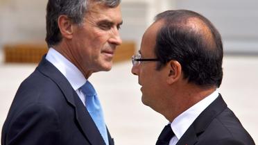 Le président François Hollande et l'ex-ministre du Budget Jérôme Cahuzac, le  4 juillet 2012 à Paris [Marion Berard / AFP/Archives]