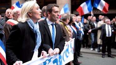 Marine Le Pen et Florian Philippot le 1er mai 2013 à Paris [Eric Feferberg / AFP]