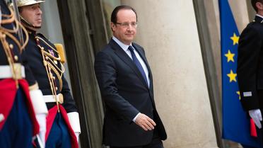 Le président français François Hollande, le 1er mai 2013 à l'Elysée [Bertrand Langlois / AFP]