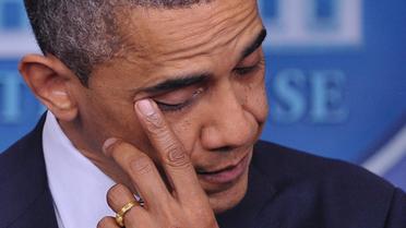 Le président Barack Obama extrêmement ému après la fusillade dans le Connecticut, le 14 décembre 2012 à Washington [Mandel Ngan / AFP]