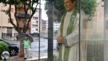 Une statue du prêtre Giuseppe Puglisi, assassiné par la mafia il y a 25 ans, photographiée le 14 septembre 2018 à Palerme en Sicile [Andreas SOLARO / AFP]