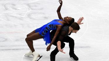 Le couple Vanessa James et Morgan Cipres patinent pour le programme court, lors du Mondial de patinage à Milan, le 22 mars 2018  [MIGUEL MEDINA / AFP]