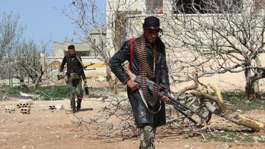 Des rebelles dans le village syrien de Morek, non loin de Hama le 7 mars 2014 [Ali Nasser / AFP/Archives]