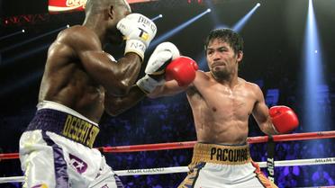 Combat entre Timothy Bradley Jr et Manny Pacquiao le 9 avril  2016 à las Vegas [John GURZINSKI / AFP]