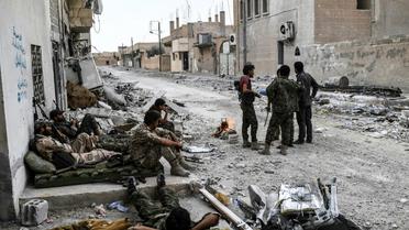 Des membres des forces démocratiques syriennes à Raqa, en Syrie, le 24 septembre 2017 [BULENT KILIC / AFP]
