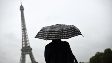Jour de pluie à Paris le 8 août 2014 [Lionel Bonaventure / AFP/Archives]