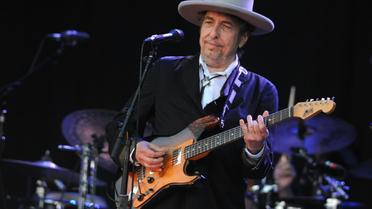 La légende de la musique folk américaine et du rock Bob Dylan joue au festival des Vieilles Charrues, le 22 juillet 2012 à Carhaix (ouest de la France) [FRED TANNEAU / AFP/Archives]