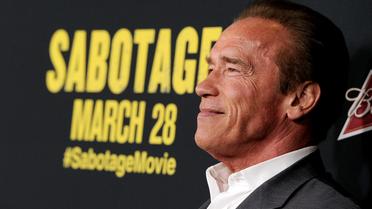 Arnold Schwarzenegger arrive à l'avant-première du film "Sabotage" à Los Angeles le 19 mars 2014 [Kevin Winter / Getty/AFP]