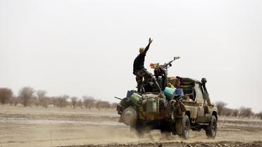 Des soldats maliens en patrouille entre Kidal et Gao, le 29 juillet 2013 [Kenzo Tribouillard / AFP/Archives]