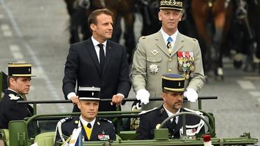 Emmanuel Macron au côté du général Francois Lecointre, le 14 juillet 2019 [Lionel BONAVENTURE / AFP]