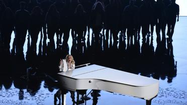 La chanteuse Lady Gaga sur la scène des Oscars, le 28 février 2016 à Hollywood en Californie [MARK RALSTON / AFP]