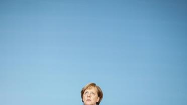 La chancelière allemande Angela Merkel lors d'une conférence de presse à Berlin le 12 janvier 2018 [Kay Nietfeld / dpa/AFP]