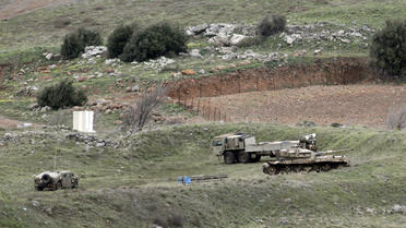 Des véhicules militaires israéliens dans le Golan, près de la frontière syrienne, le 11 février.