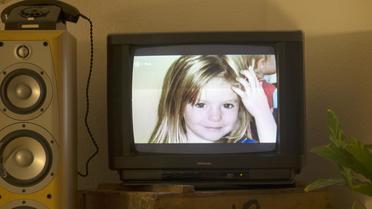 Portrait de la fillette Britannique Madeleine McCann disparue en 2007 au Portugal, le 16 octobre 2013 à la télévision allemande [Johannes Eisele / AFP/Archives]