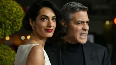George Clooney et son épouse Amal à l'avant-première de "Ave César" le 1er février 2016 à Westwood, en Californie [Valerie Macon / AFP]
