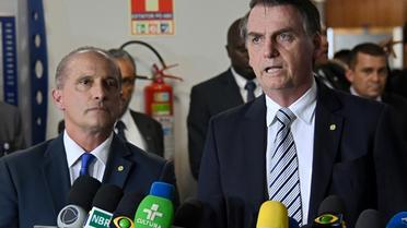 Le président élu Jair Bolsonaro (à droite) et son futur chef de cabinet Onyx Lorenzoni, le 20 novembre 2018 à Brasilia [EVARISTO SA / AFP/Archives]
