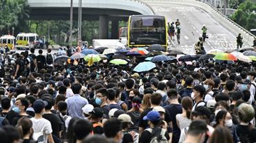 Des protestataires occupent les deux principales autoroutes à proximité des locaux du gouvernement de Hong Kong, le 12 juin 2019.