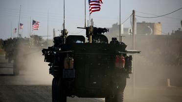 (ARCHIVES) Des véhicules blindés américains près de la ville syrienne de Manbij le 5 mars 2017 [DELIL SOULEIMAN / AFP/Archives]