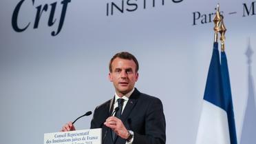 Le président Emmanuel Macron s'adresse aux convives lors du diner annuel du CRIF à Paris, le 7 mars 2018 [ludovic MARIN / POOL/AFP]