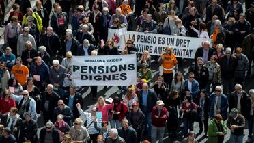 Des retraités espagnols manifestant pour la défense des retraites, le 17 mars 2018 à Barcelone [Josep LAGO / AFP]