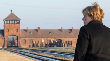 La chancelière allemande Angela Merkel au camp nazi d'Auschwitz-Birkenau, en Pologne, le 6 décembre 2019 [John MACDOUGALL / AFP]