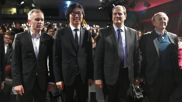 Francois de Rugy (g), Jean-Vincent Placé (2e g), Jean-Luc Bennahmias (d) et Jean-Christophe Cambadélis lors du congrès fondateur de l'UDE à Paris, le 17 octobre 2015 [DOMINIQUE FAGET / AFP]
