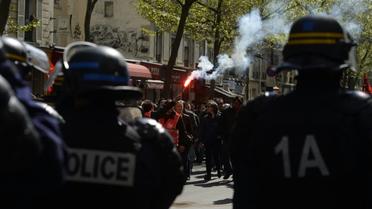 Des membres des forces de l'ordre lors d'une manifestation contre la loi travail, le 28 avril 2016 à Paris [ALAIN JOCARD / AFP/Archives]