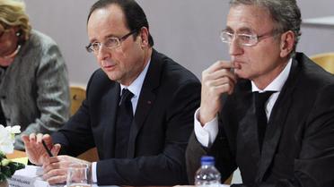 François Hollande (g) et Le sénateur PS André Vallini à Grenoble le 23 janvier 2013 [Robert Pratta / Pool/AFP/Archives]