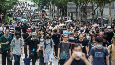 Des manifestants pro-démocratie à Hong Kong le 17 août 2019 [ISAAC LAWRENCE / AFP]