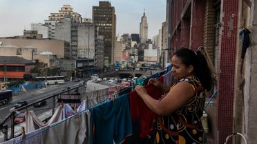 Une habitante d'un squat dans la banlieue de Sao Paulo au Brésil, le 14 mai 2018 [NELSON ALMEIDA / AFP/Archives]