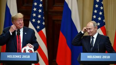 Donald Trump et Vladimir Poutine donnent une conférence de presse à l'issue de leurs pourparlers à Helsinki, le 16 juillet 2018 [Yuri KADOBNOV / AFP]