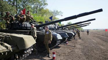 Des séparatistes prorusses participent à une compétition militaire entre unités blindées près de Torez, dans la région de Donetsk, en Ukraine, le 24 septembre 2015 [ALEKSEY FILIPPOV / AFP/Archives]