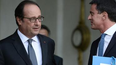 Le président François Hollande et le Premier ministre Manuel Valls à l'issue du conseil des ministres le 28 septembre 2016 à l'Elysée à Paris [STEPHANE DE SAKUTIN / AFP/Archives]