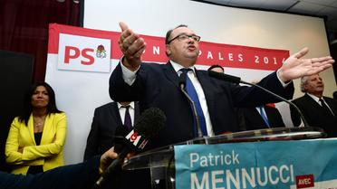 Patrick Mennucci à l'annonce des résultats de la primaire socialiste le 20 octobre 2013 à Marseille. A gauche: Samia Ghali